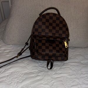 Brown Checkered cross body Backpack